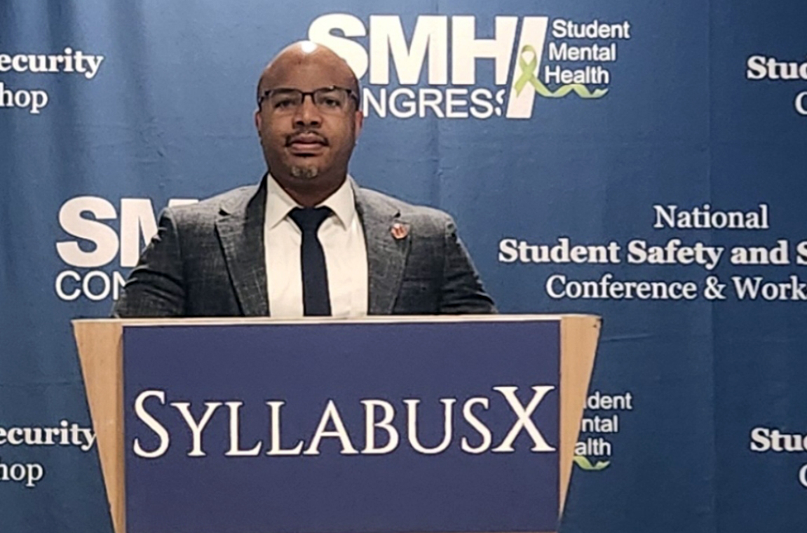 Chief Kareem Easley at podium at safety and security conference