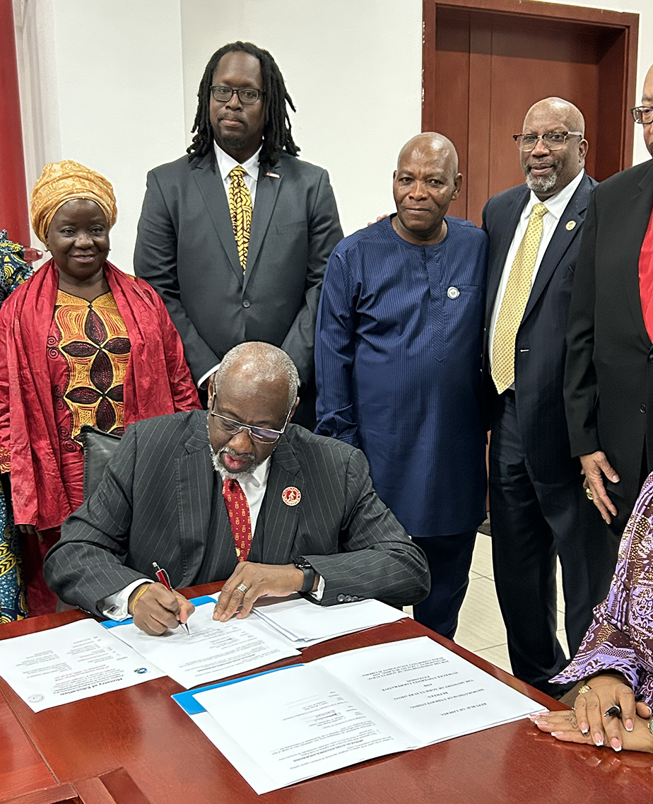 Dr. Brown signing MOU