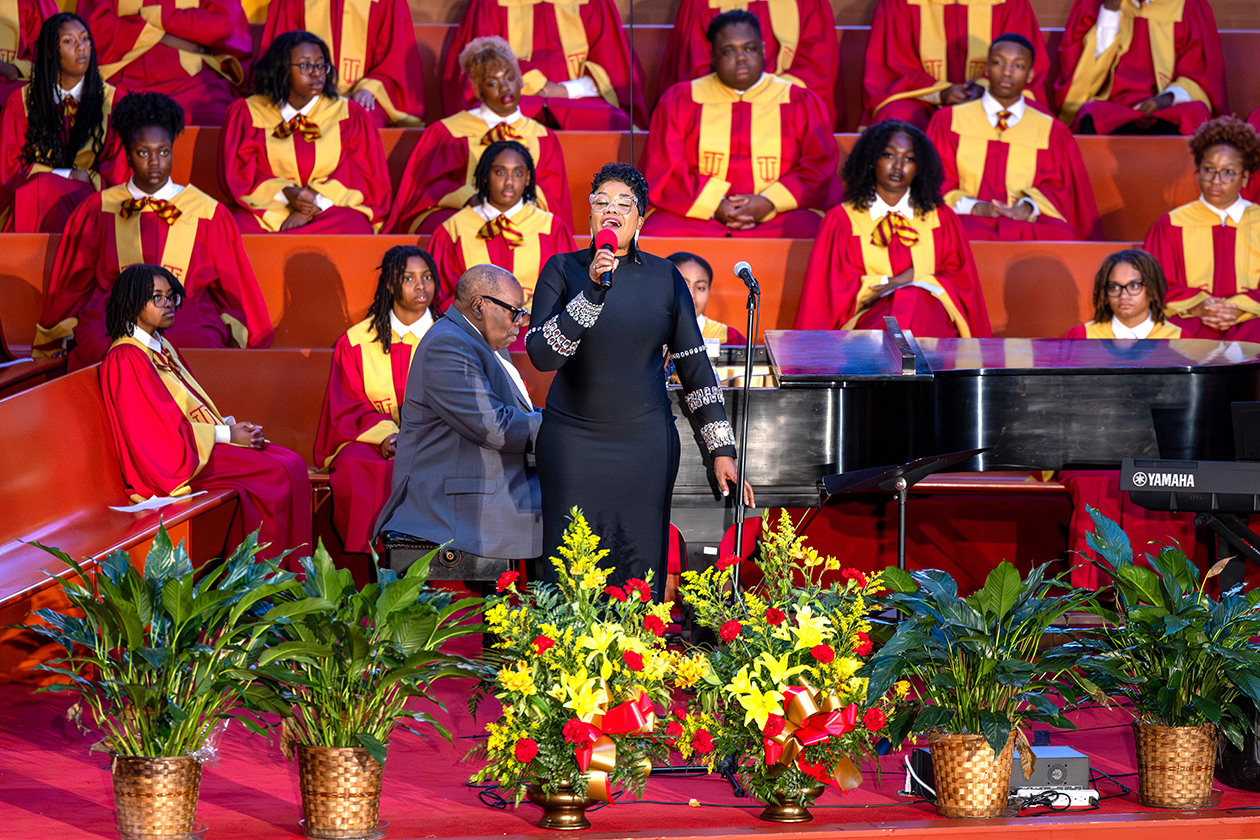 Kimberly Pointer sings at the funeral service