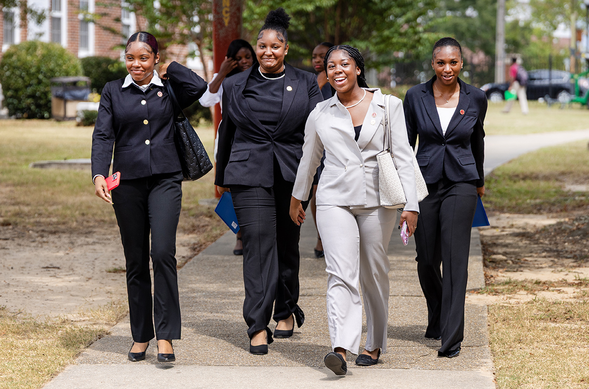 Four TU female students dressed in business attire
