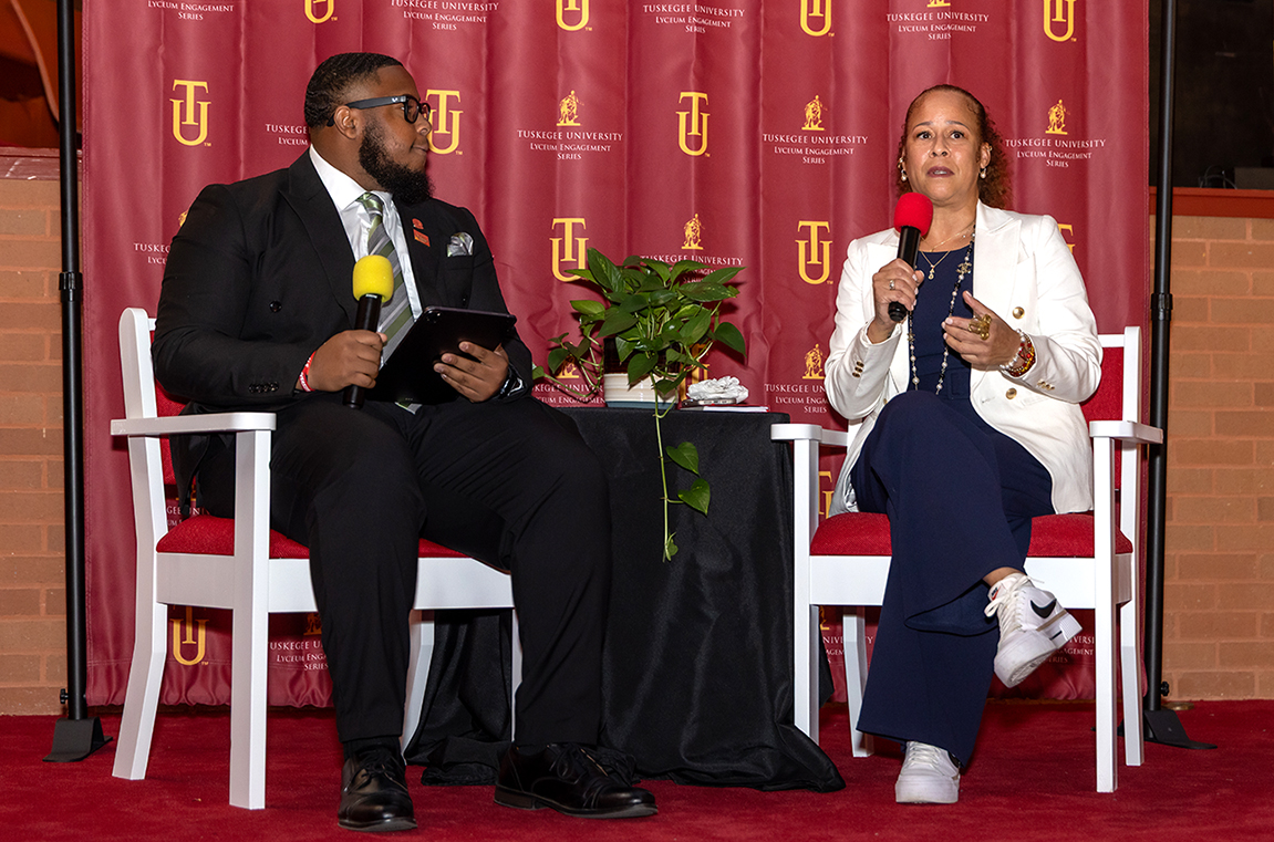 Lyceum speaker Collette V. Smith seated with moderator Richard Scott