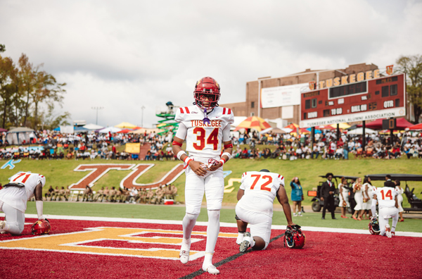 TU Football players pray at Abbott Stadium